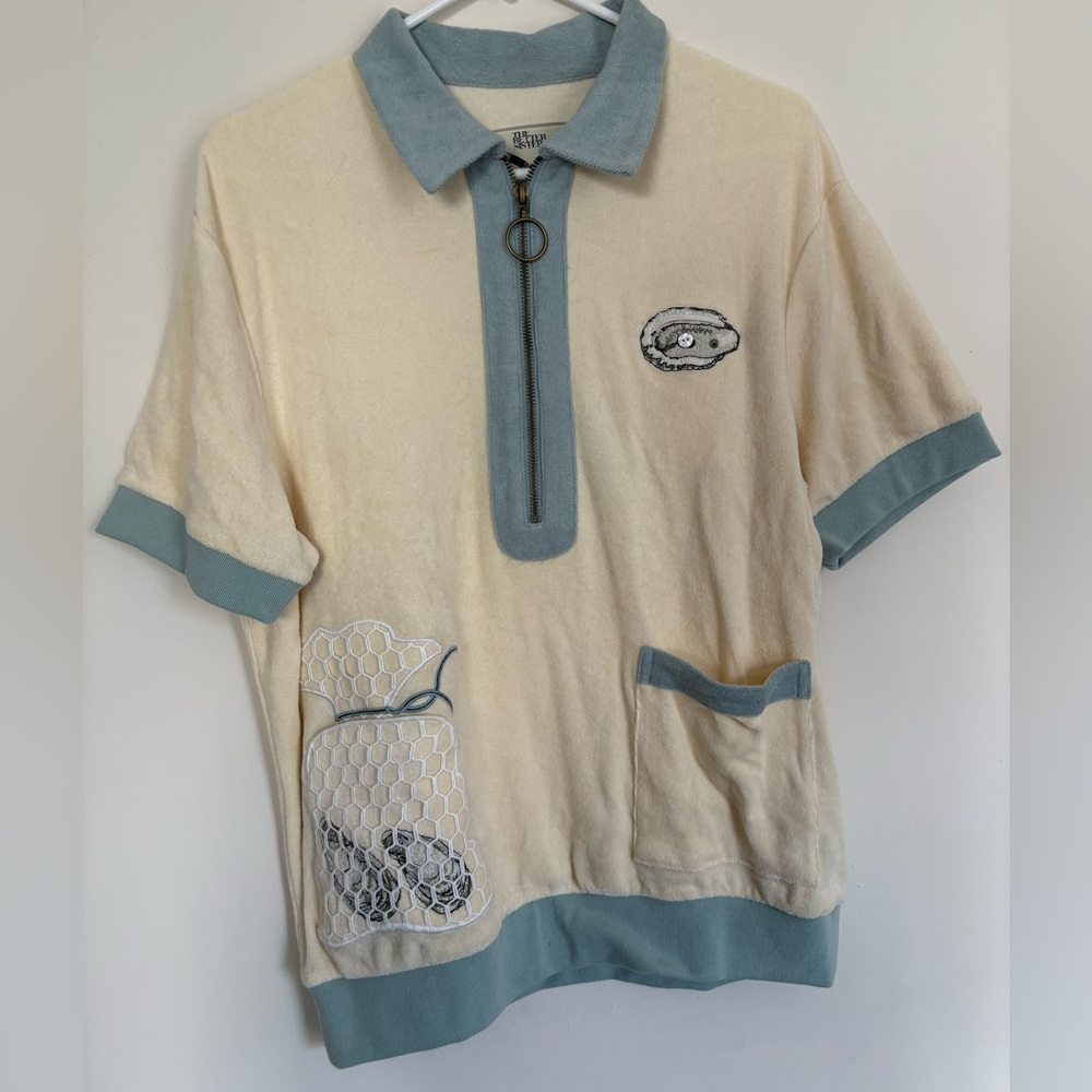Tombolo Unisex Short-Sleeve Terry Cloth Polo in Yellowish Cream with Blue Trim